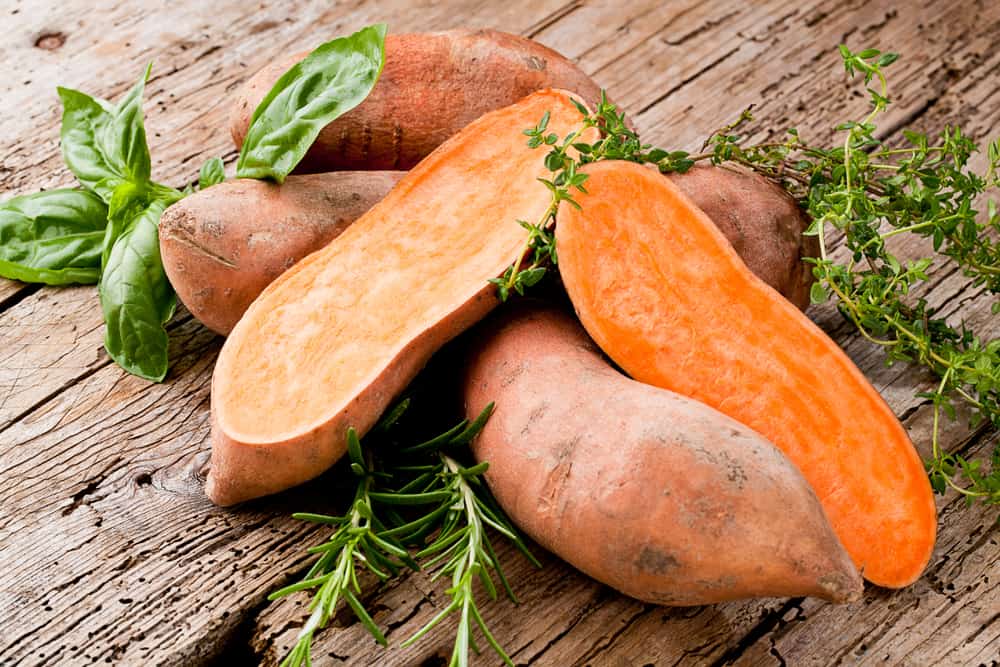 Sweet,potato,on,wooden,background