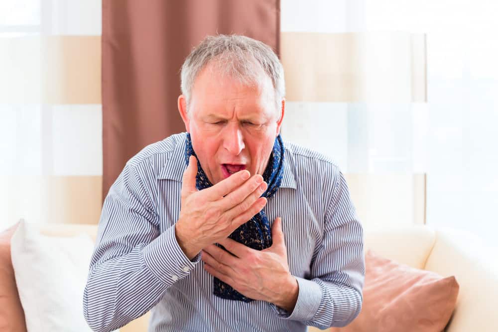 Senior Coughing Having Flu