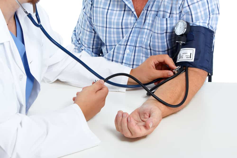 Doctor,checking,old,man,patient,arterial,blood,pressure.,health,care.