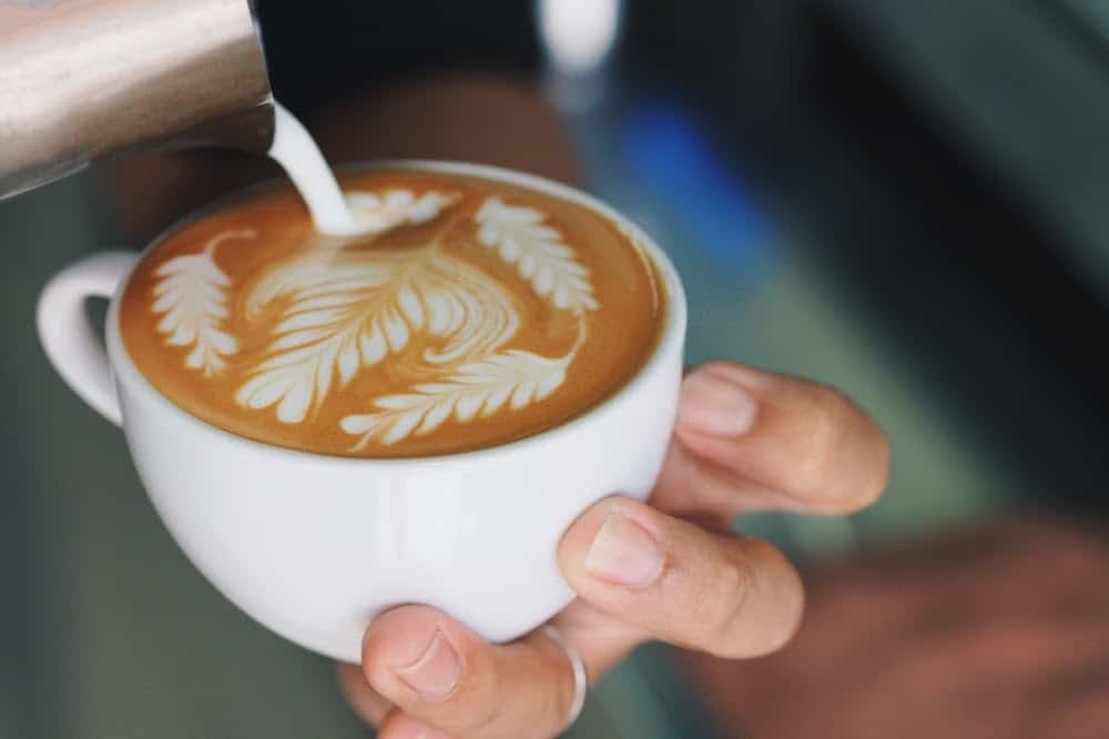 Coffee Latte Art Making By Coffee Master In The Cafe.